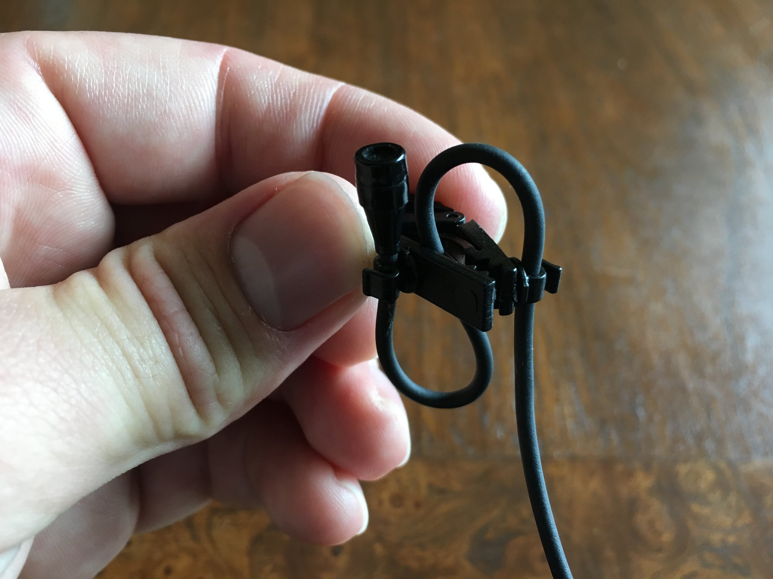 Step 3. If your clip has a point for tension relief feel free to use it so your mic doesn't get pulled by cable snags. This is not a dire step, but it is definitely helpful. Tape would be your substitute to this option on the inside of the garment you are miking. 
