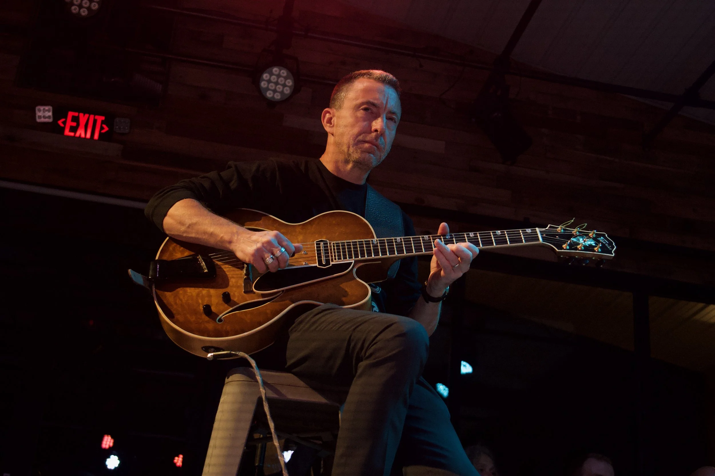 Will Sellenraad portrait with guitar