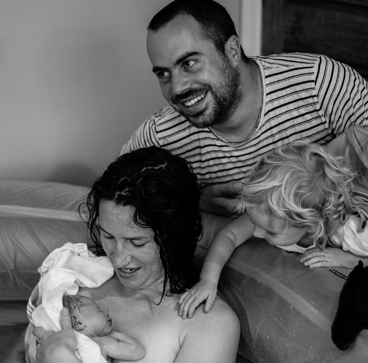 Alex, Connie, Vita, and Lucia Matisse minutes after Lucia's birth.