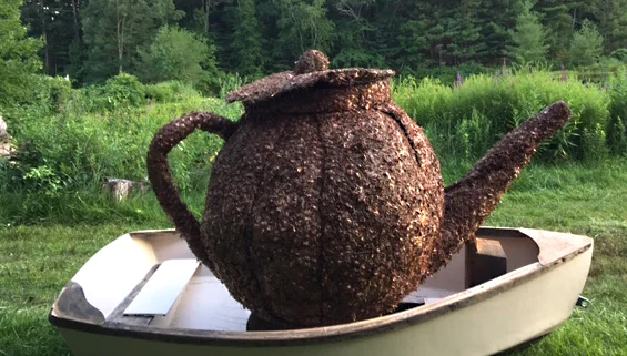 A Teapot, a Woman, and maybe a Boat