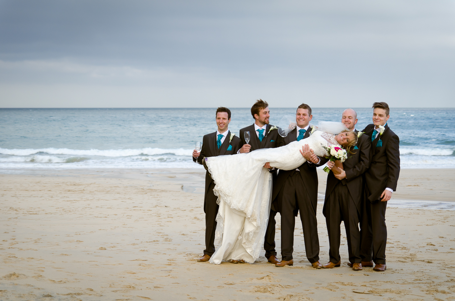 joe and kerry beach bride n groomsmen.jpg