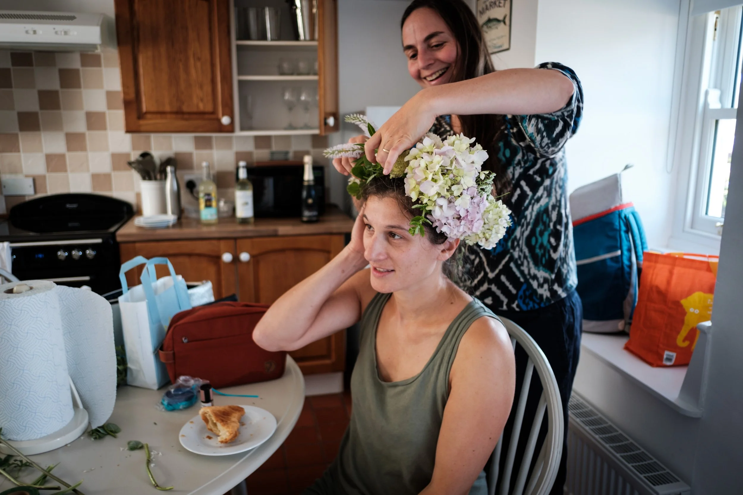 A head piece of beautiful flowers whlst getting ready for a chypraze wedding