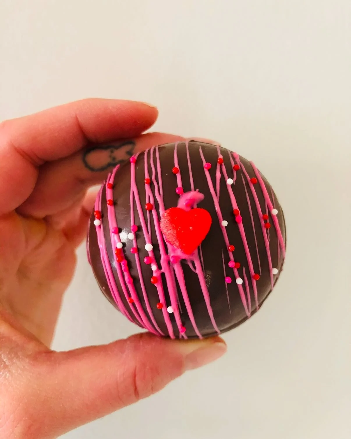 Last-minute Valentine's Day gift idea? I'm whipping up a limited batch of hot chocolate bombs and chocolate covered strawberries this week! DM me for details! ❤️