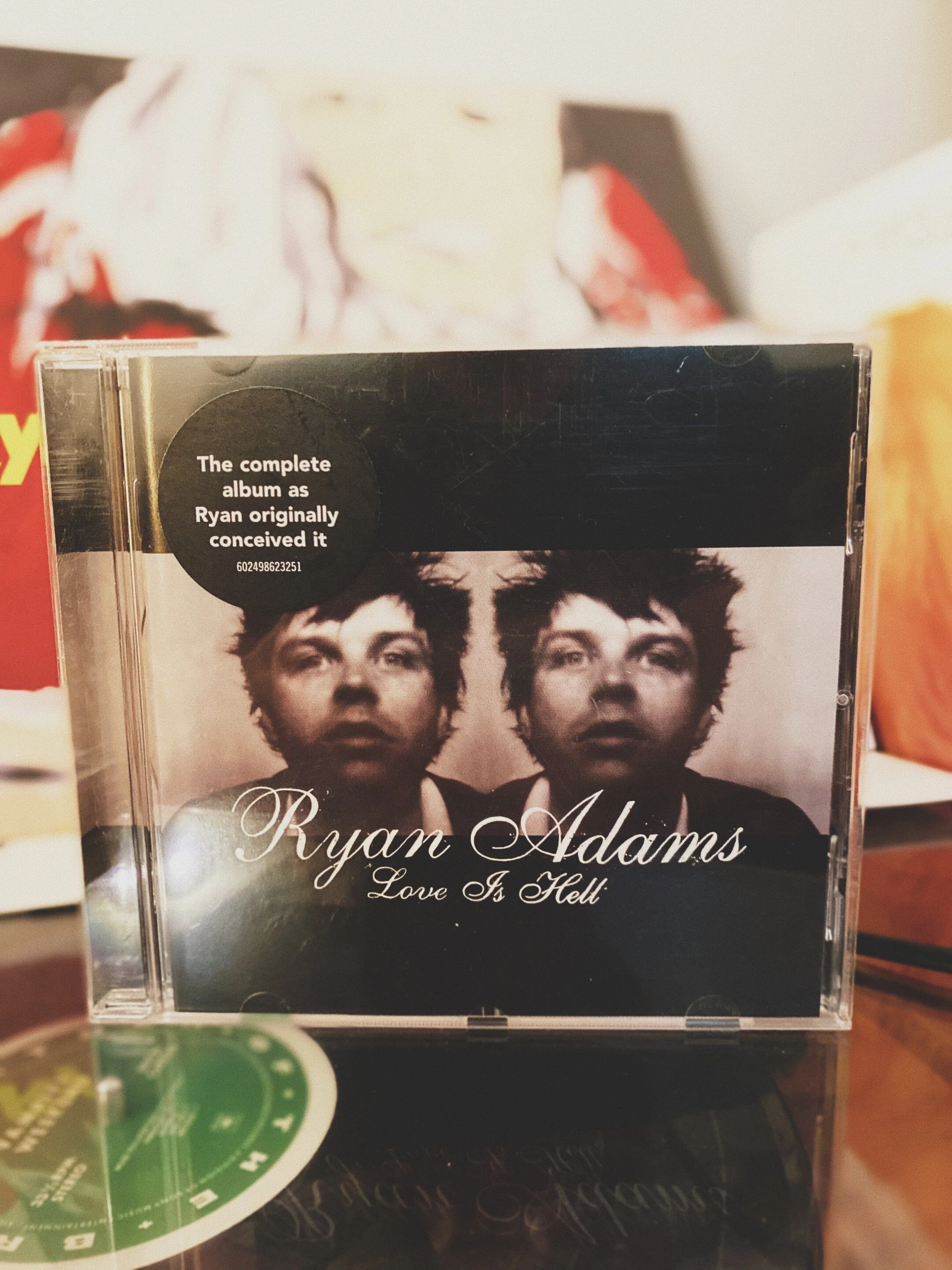 8. Ryan Adams: Love is Hell   I was 24. I stumbled over this album while reading in a  music magazine . Somebody had written that this guy did the best cover of an  Oasis  song and that it was a pity that his own material wasn’t as good.  When I listened to the album in its entirety, I knew that this music journalist was wrong.  Ryan Adams  is one of the  most gifted songwriters  around.  It’s not a very popular opinion these days, considering the accusations in recent years. But I’m only referring to his songs, not to his person or his behavior. This album was my entry to his work as a songwriter. It’s not my favorite one, but it did stick with me and made me curious to hear what he was coming up with next.  And he did come up with a lot of stuff, often releasing  more than one album a year . When asked in an interview how he did it, Adams said once: “If you consider yourself as being a songwriter, you should be able to write  12 passable songs a year,  shouldn’t you?”.  That’s something I hold on to if there isn’t a spark.
