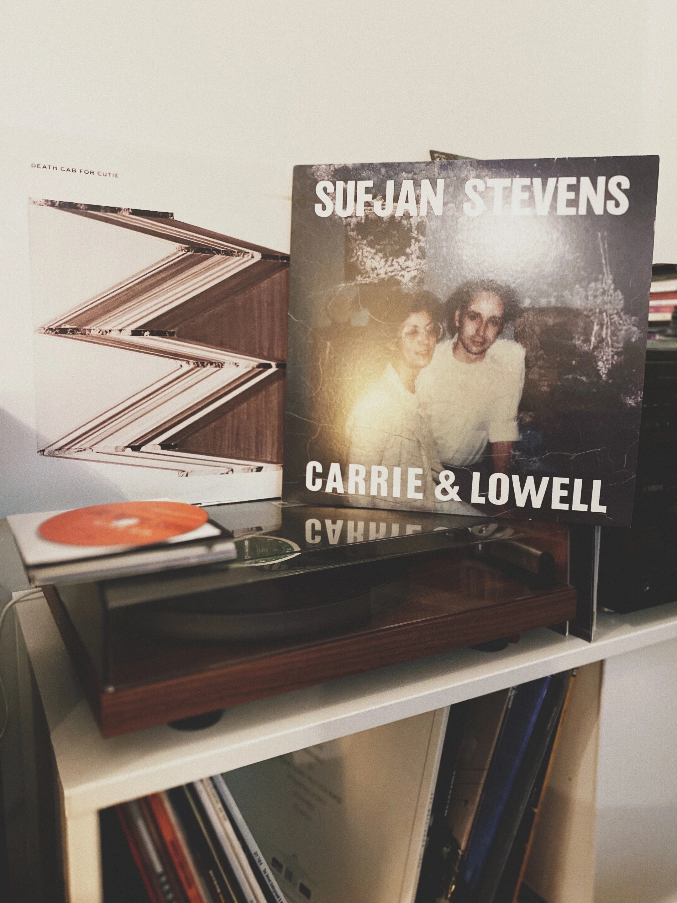 11. Sufjan Stevens: Carrie &amp; Lowell   I was 35. Allow me to break chronology here. I was a married man and the father of a little boy. My wife was pregnant again and we would soon welcome our daughter into this world.   In fact,  2 albums  that I hold dear were released the week she was born:  Kintsugi  by  Death Cab for Cutie  and  Carrie &amp; Lowell  by  Sufjan Stevens . I love both, as different as they are. Just like my kids.  Kintsugi  is the mature album of a little indie band that made it big. It’s  polished  and  shiny  but made by people who grew up without selling out on their ideals. At least, that is what I choose to believe.  Carrie &amp; Lowell  is as  heartbreaking  as life itself. It’s full of  loss  and  love . It’s a record that will be as  true  and  eternal  in one hundred years.   A few weeks after our daughter was born, I had to go some place and I was in a real hurry. I put both albums on  top of my car  and ran back into the house because I had forgotten something. Pampers probably. I came back, drove away and forgot about the albums on my car. I was devastated when I realized what had happened.   A couple of days later, I found both albums in my letterbox. They had come back to me. Somebody in the street where I live must have found them, counted 1 and 1 together and came to the conclusion that it must have been my CDs. Both were scratched but played without a problem. And like that, they will forever be connected to the birth of my daughter.