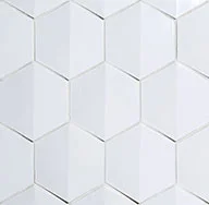 Crest Crest is a sheet-mounted 4-inch dimensional hexagon ceramic tile with a slightly raised center.