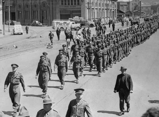 Figure 4: Lieutenant Colonel James Hēnare, followed by Regimental Sergeant Major Charlie Norris, leading his men towards Aotea Quay during a parade in Wellington upon 28th Māori Battalion’s return to New Zealand. Source: National Library of New Zealand (unknown photographer), reference # 1/2-C-016251-F.