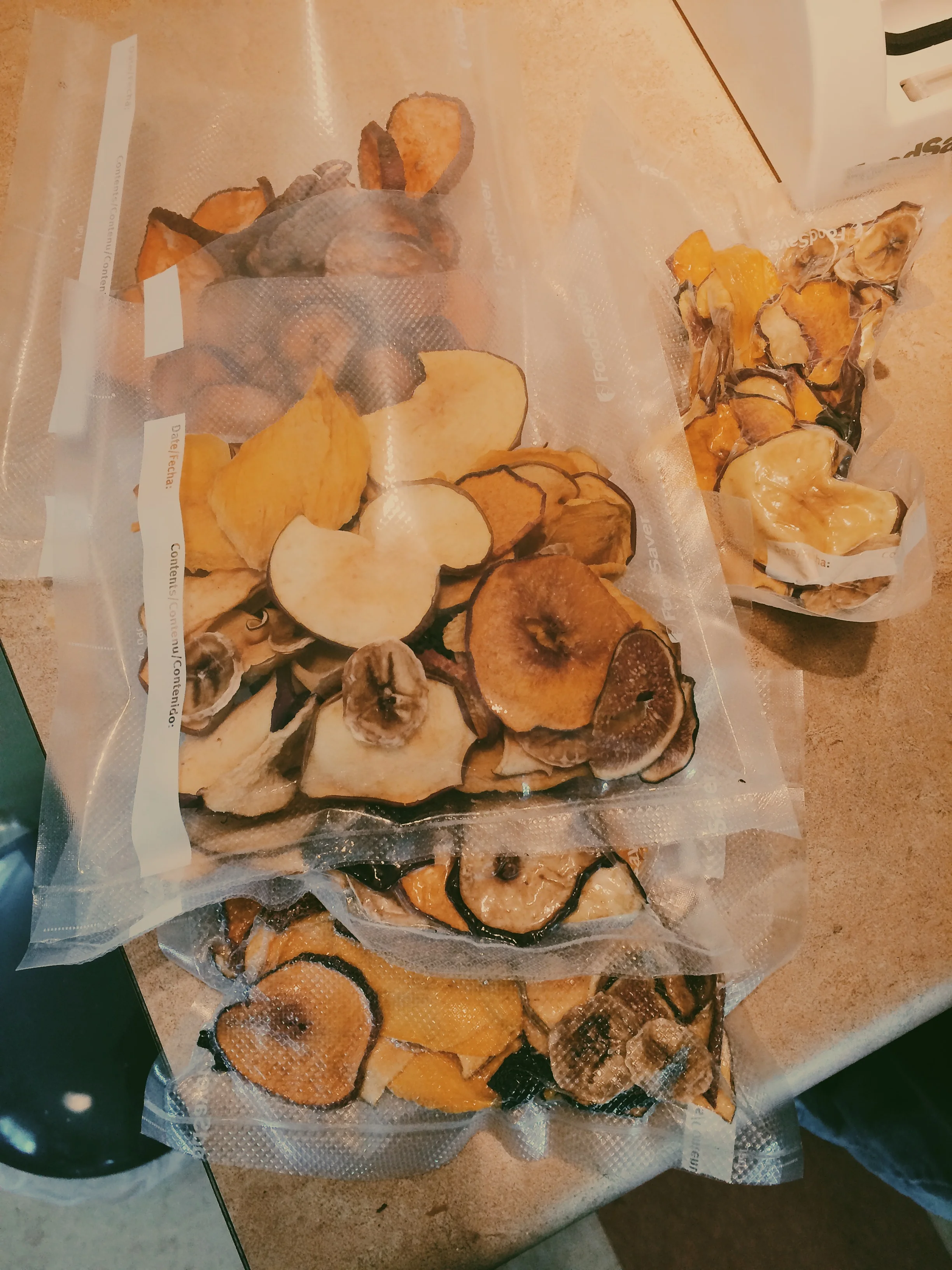 batches of dried peaches, apples, mangos, figs, and pears!