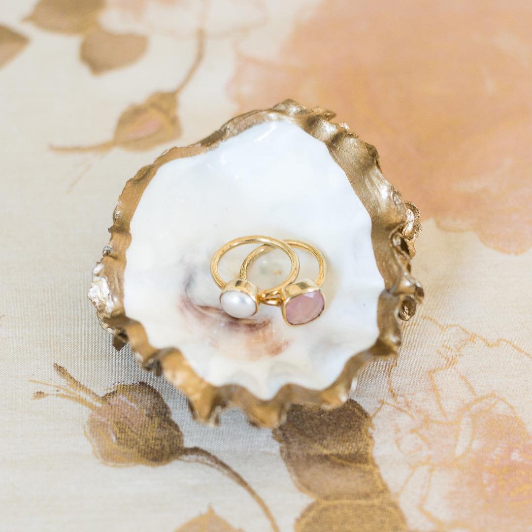Grit and Grace oyster shell with jewelry
