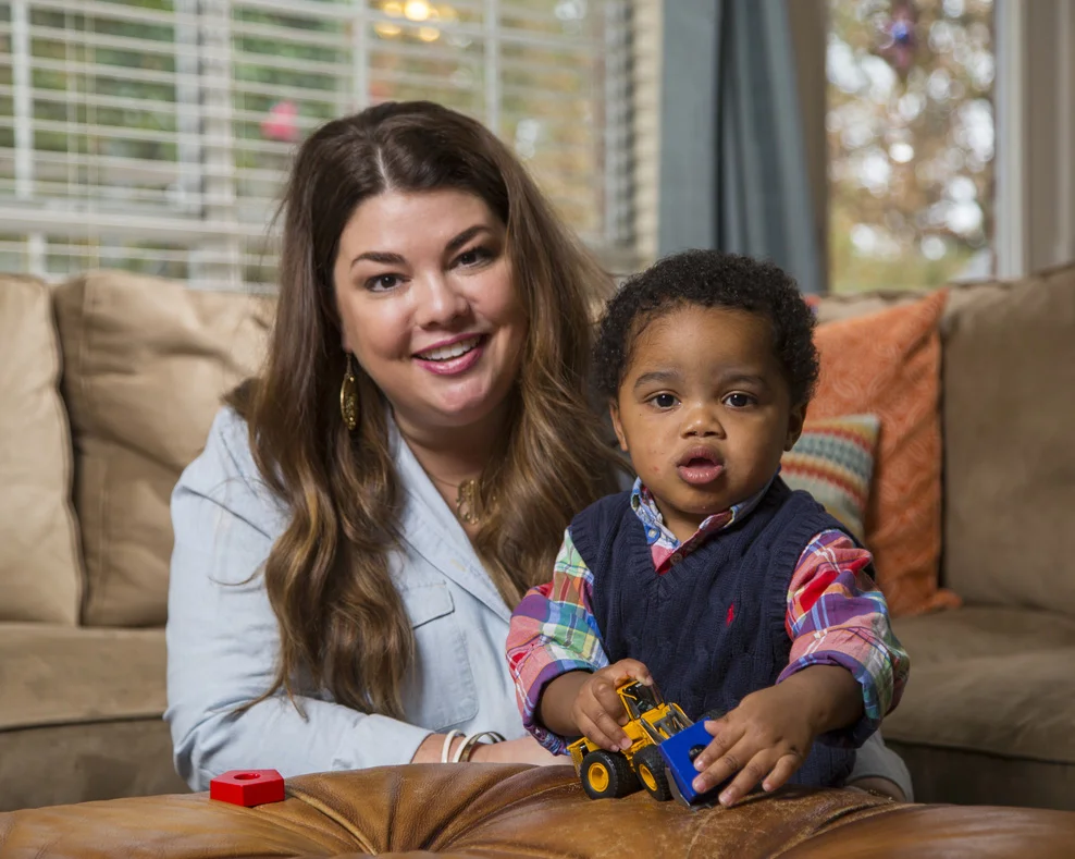 Julie and baby Elijah. Photo by Beth Hall .