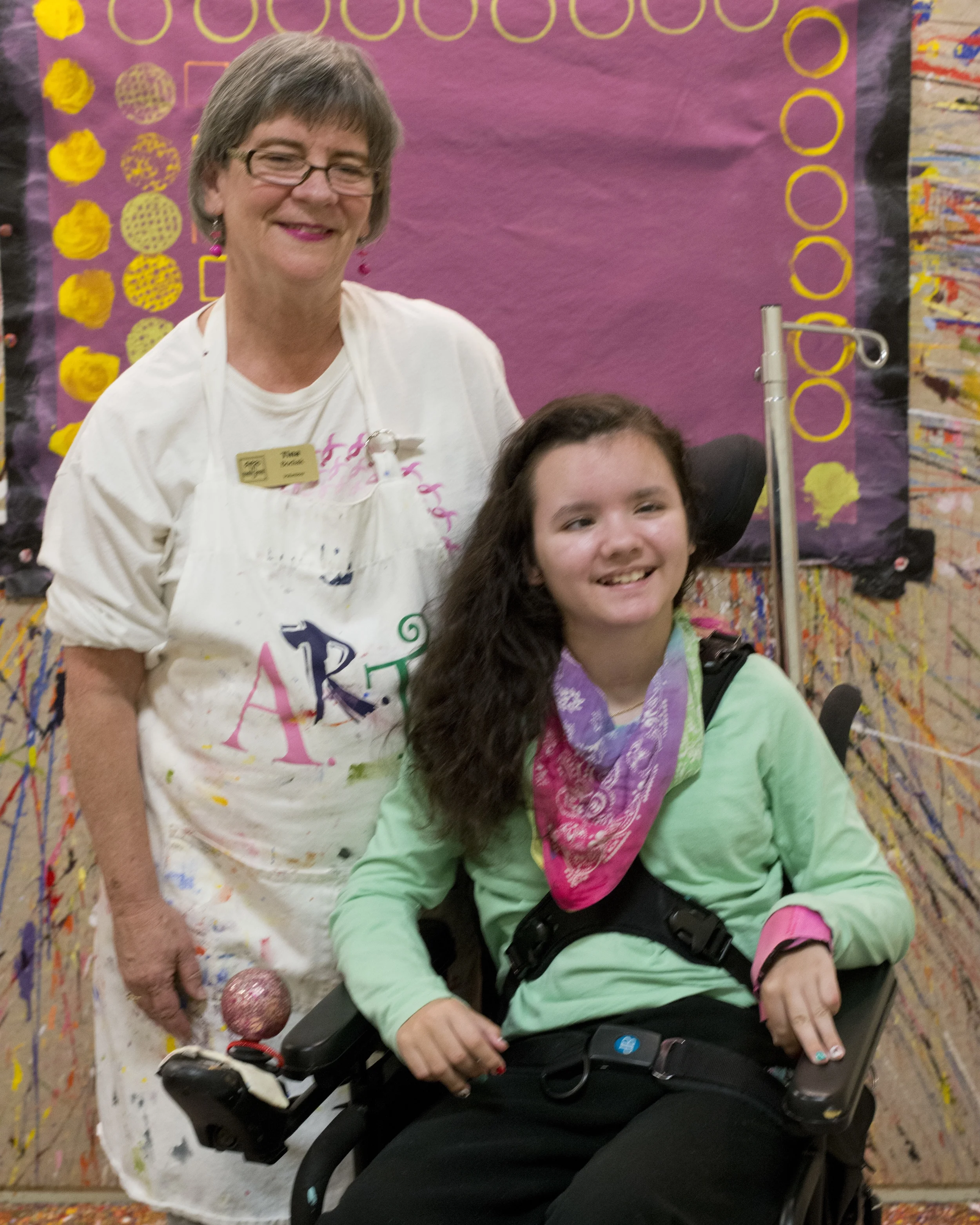 BODIAK, A RETIRED LITTLE ROCK ELEMENTARY SCHOOL TEACHER, volunteers AS A TRACKER. MADDYE, AGE 12, USES A SPEAKING PROGRAM ON HER IPAD, AS WELL AS THE LASER, TO DIRECT.