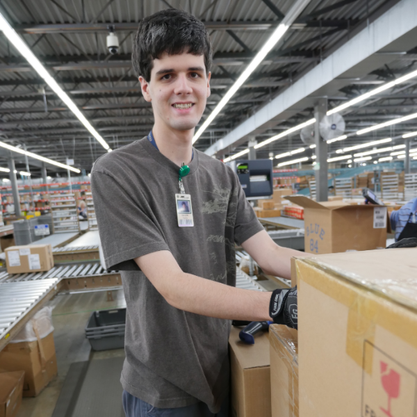 After graduating from the program, Devon now works in the distribution center at Dillard’s. 