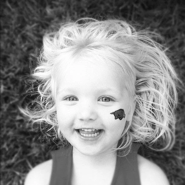 The kids love stickers for their faces or red hairspray that washes out! 