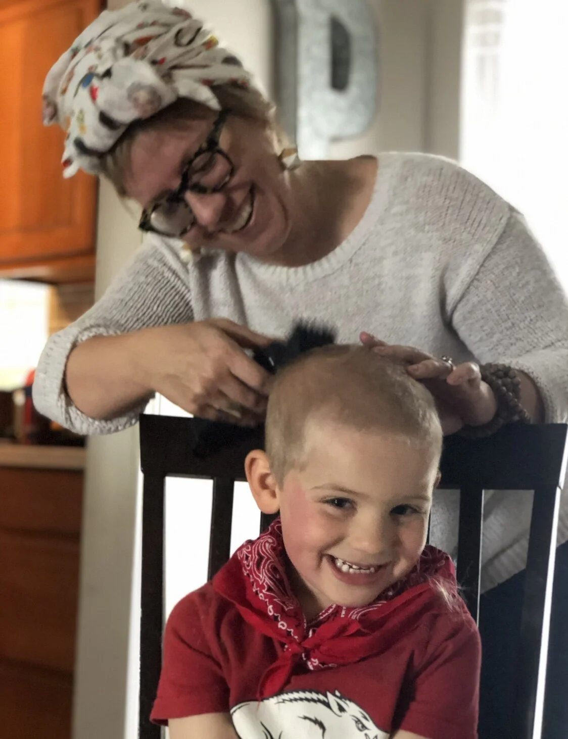 My good friend jessica came over to cut my hair once it started falling out. Bennett decided he wanted hair just like mommy.
