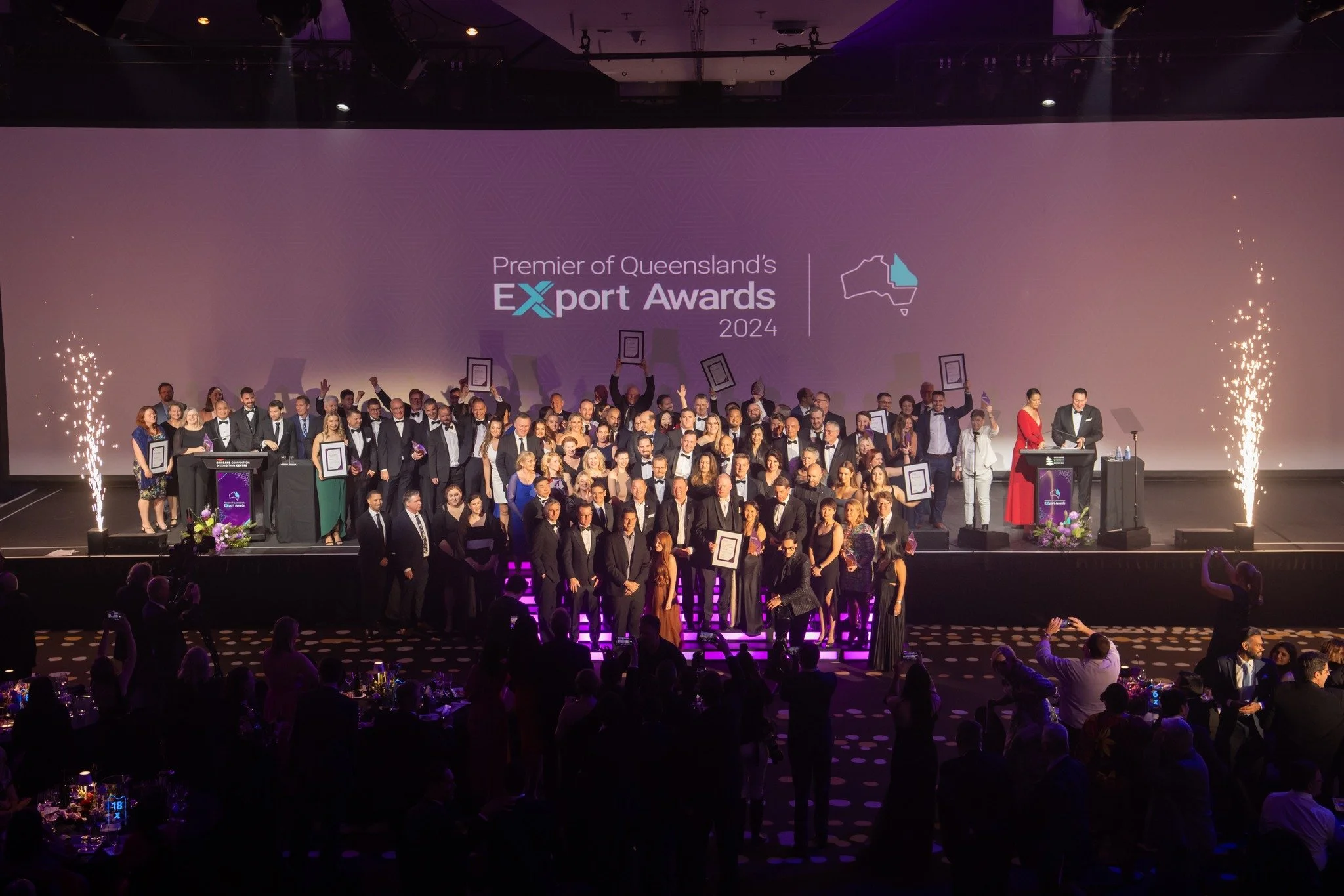 Malibu Crew performing at the Premier of Queensland's Export Awards—headline gala entertainment featuring vocals, saxophone, and DJ at a prestigious Queensland ceremony.