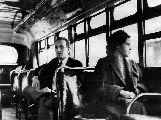 Rosa Parks riding on the Montgomery Area Transit System bus in Montgomery, Ala. Parks refused to give up her seat on a Montgomery bus Dec. 1, 1955, and ignited the boycott that led to a federal court ruling against segregation in public transportation. (Photo: AP)