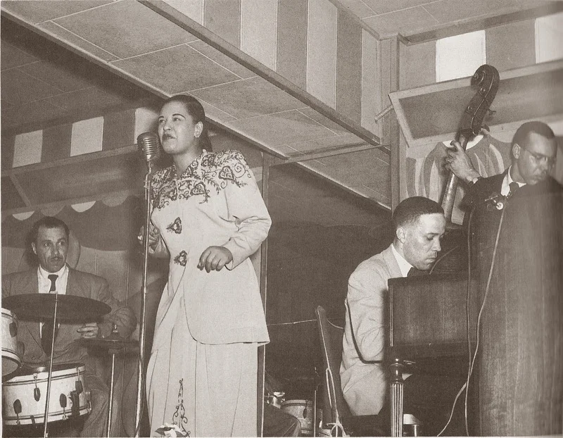My grandfather, Bobby Tucker, on piano accompanying the great Billie Holliday