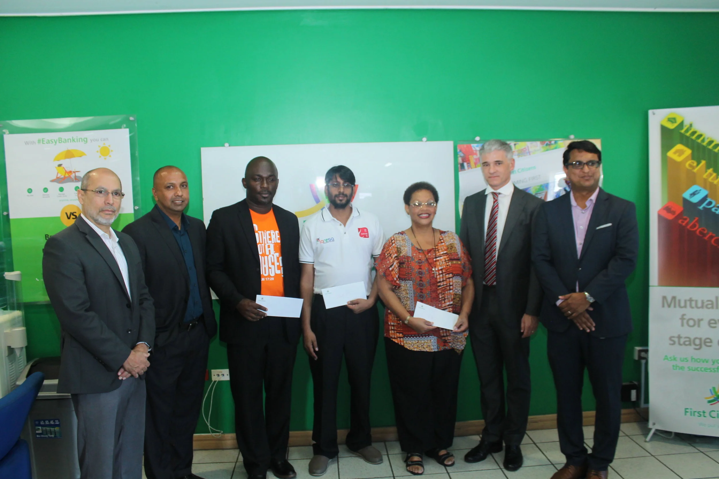 Joint Chambers presents flood relief funds to three NGO’s