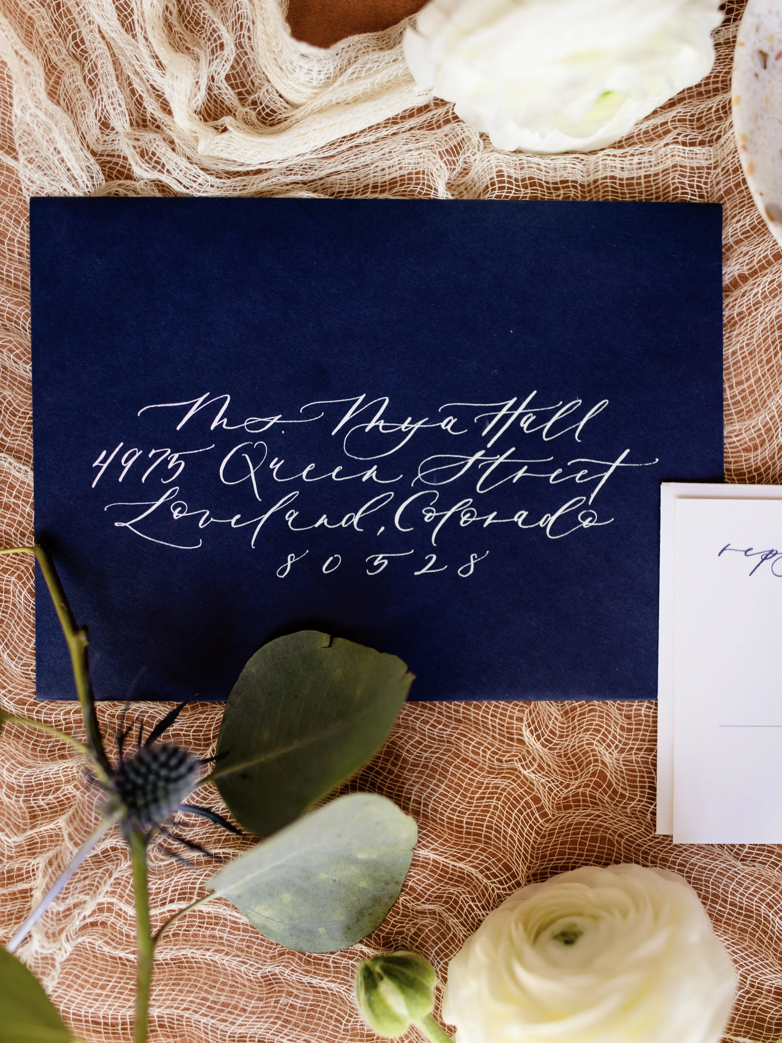 Hand-lettered calligraphy envelope addressing in modern script