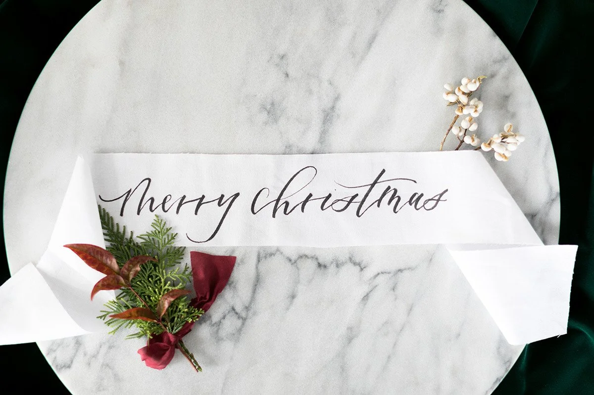 Personalized calligraphy Christmas banner with custom hand-lettered holiday greeting