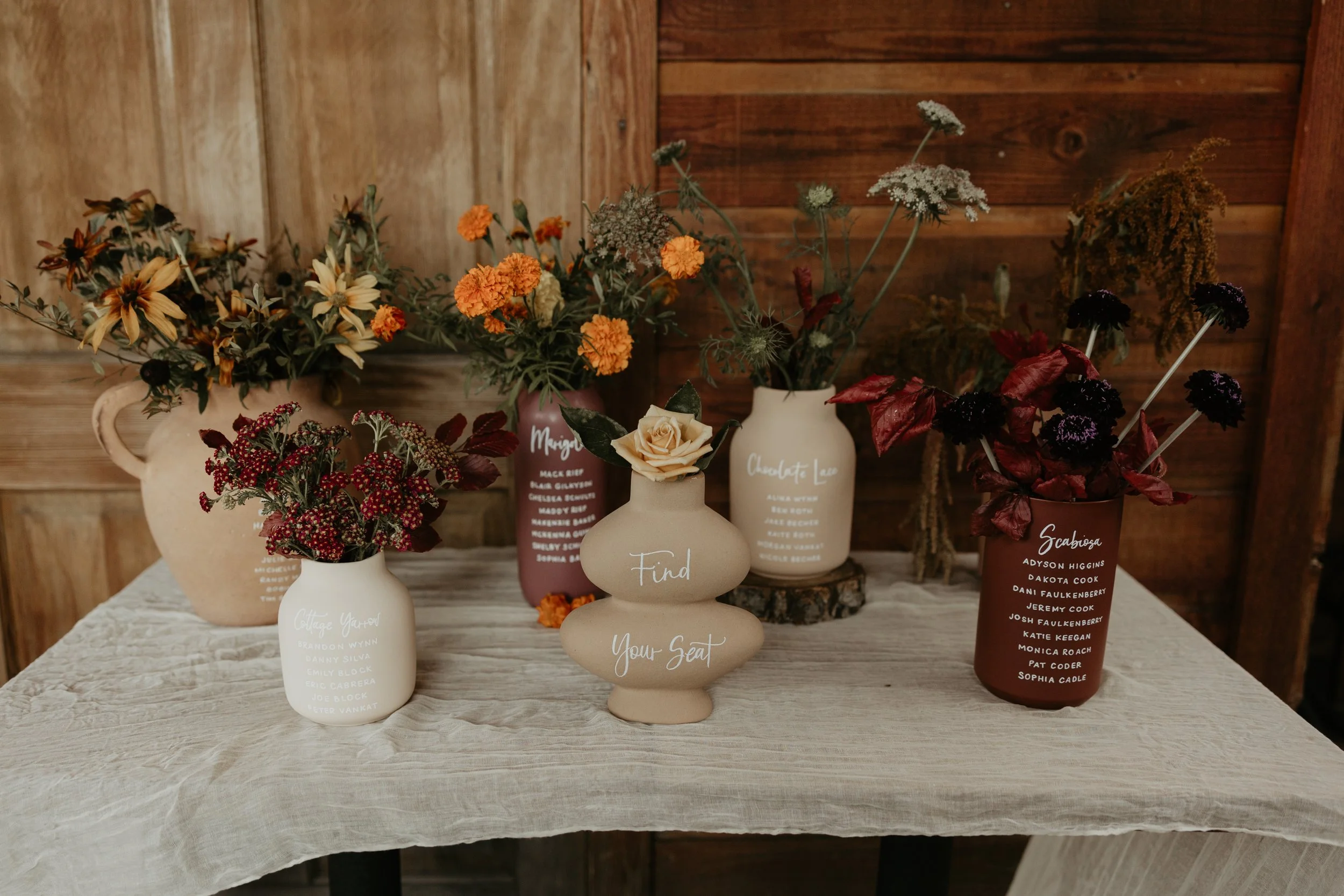 vase seating chart with calligraphy