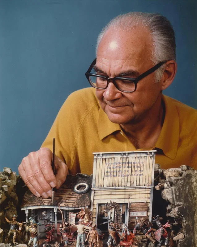 Ray Anderson working on a box diorama paying tribute to his recurring themes and characters. 