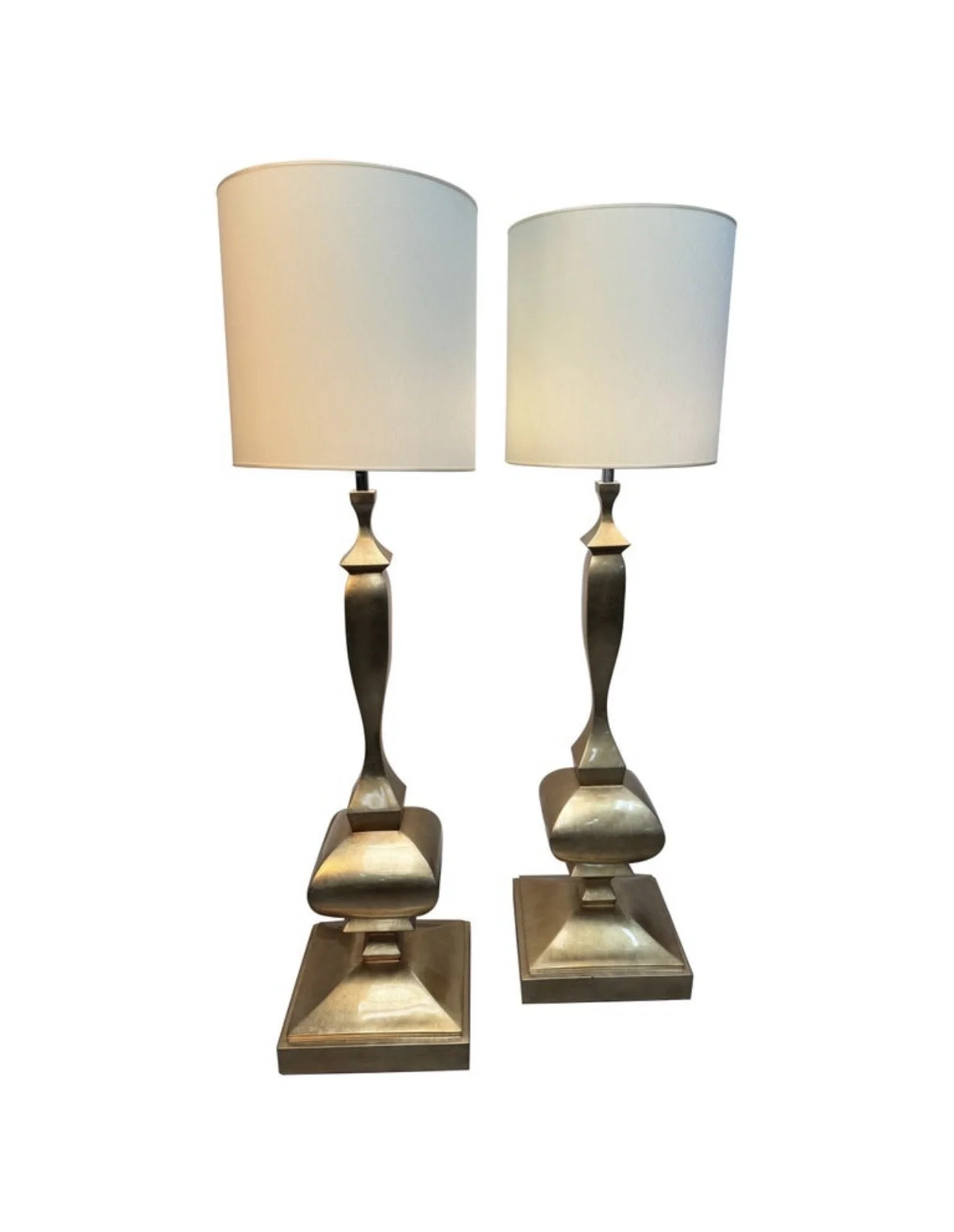 A rare 1970s pair of large scale architectural gold metal floor lamps by Alberto Smania