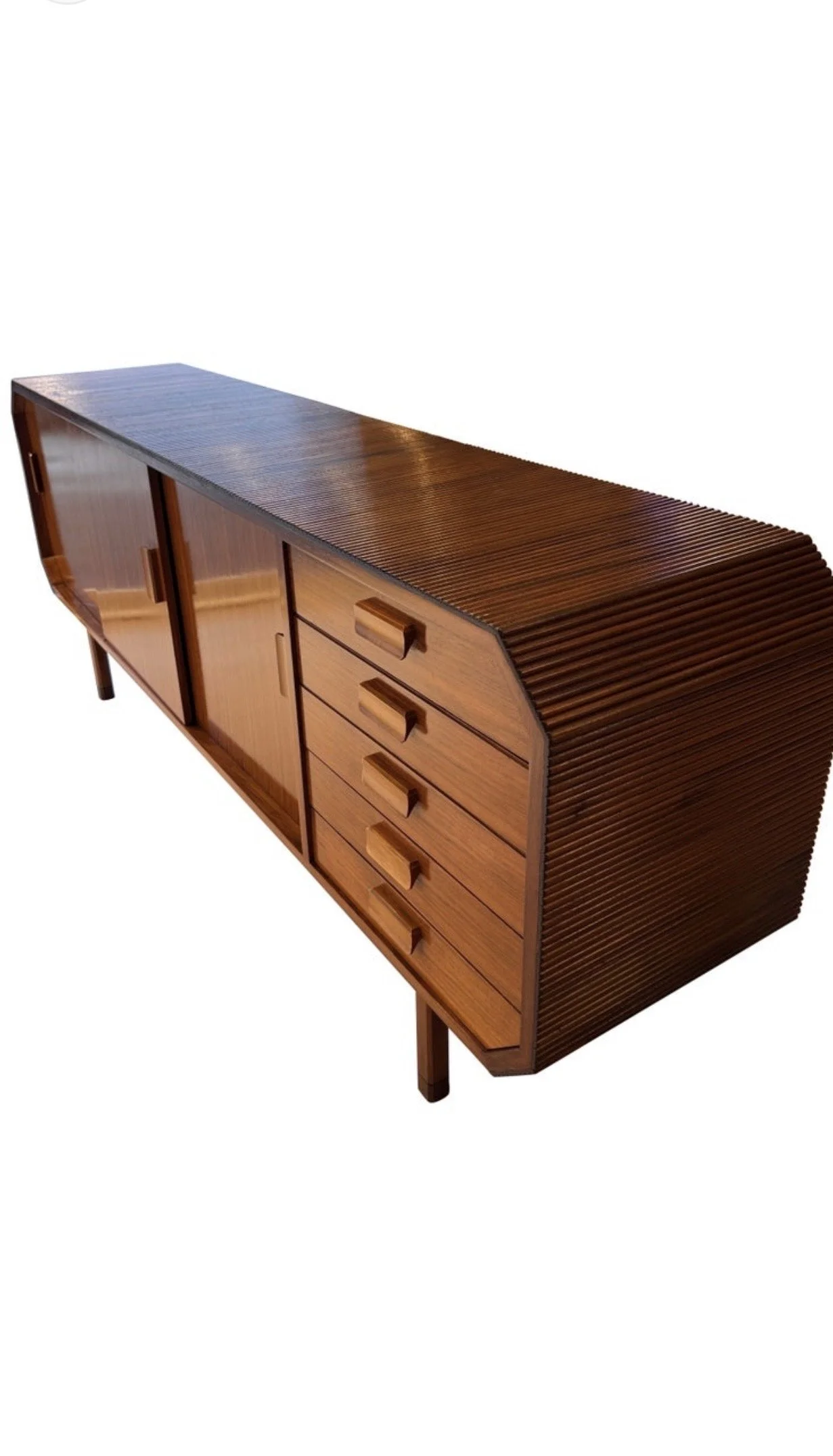 A large Italian walnut sideboard with pencil reed and curved waterfall edges