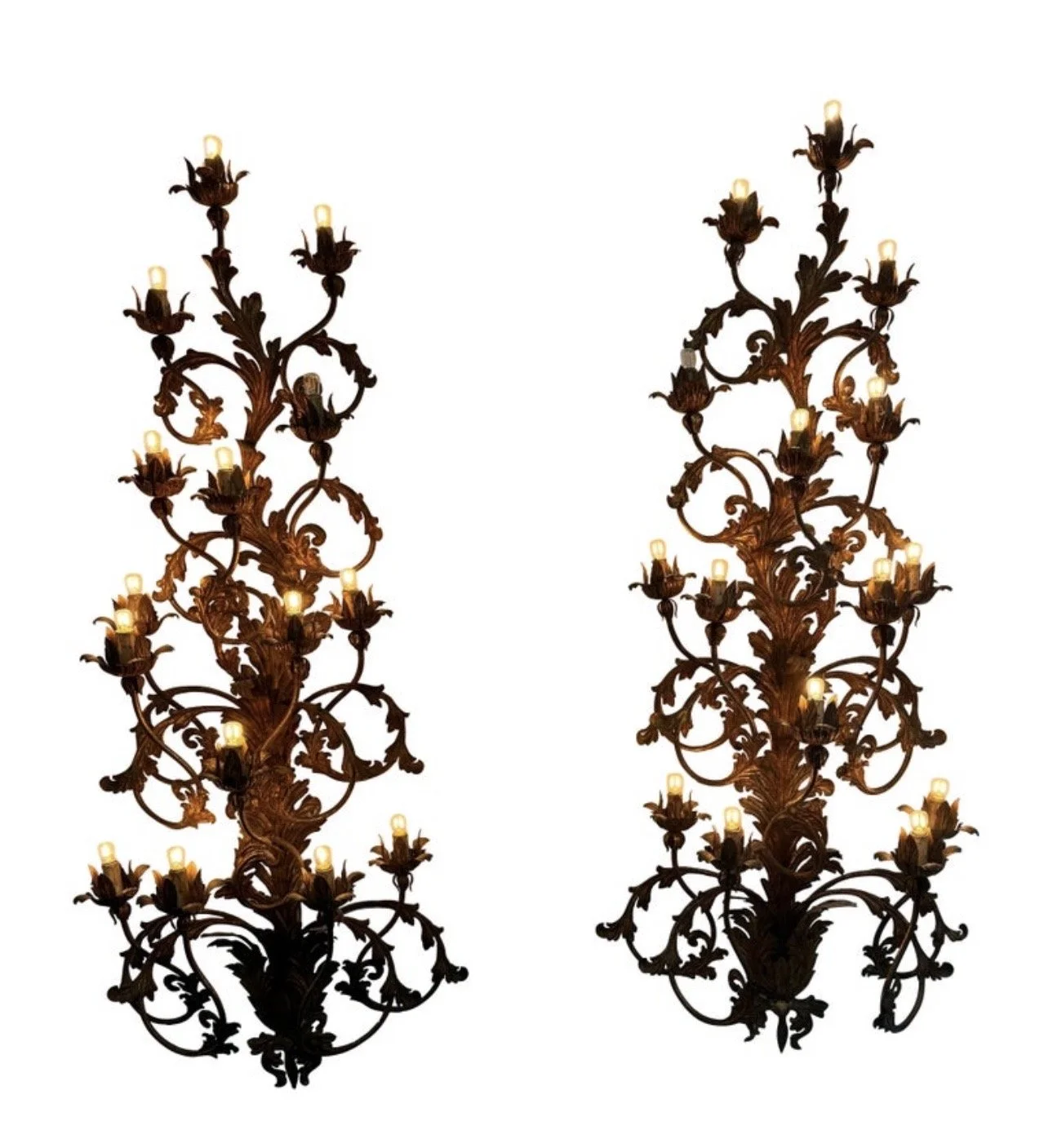 A monumental pair of Venetian gilt iron wall sconces