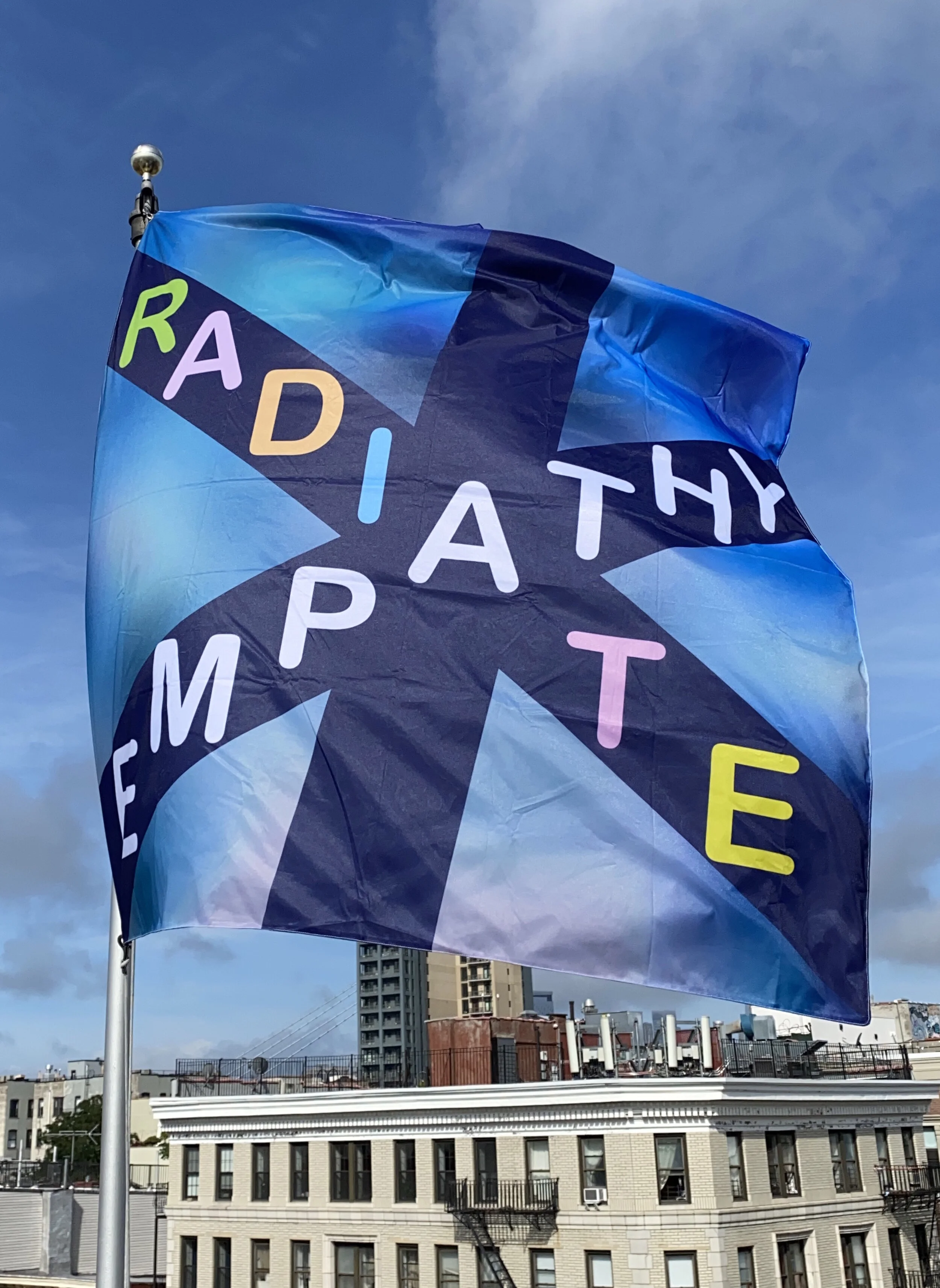  Natasha Sweeten and Kelly Chorpening  RADIATE EMPATHY  2021  60 x 60 inches  Installed at Grand Flag (179 Grand St near Bedford Ave, Brooklyn) June 25 - August 1, 2021     