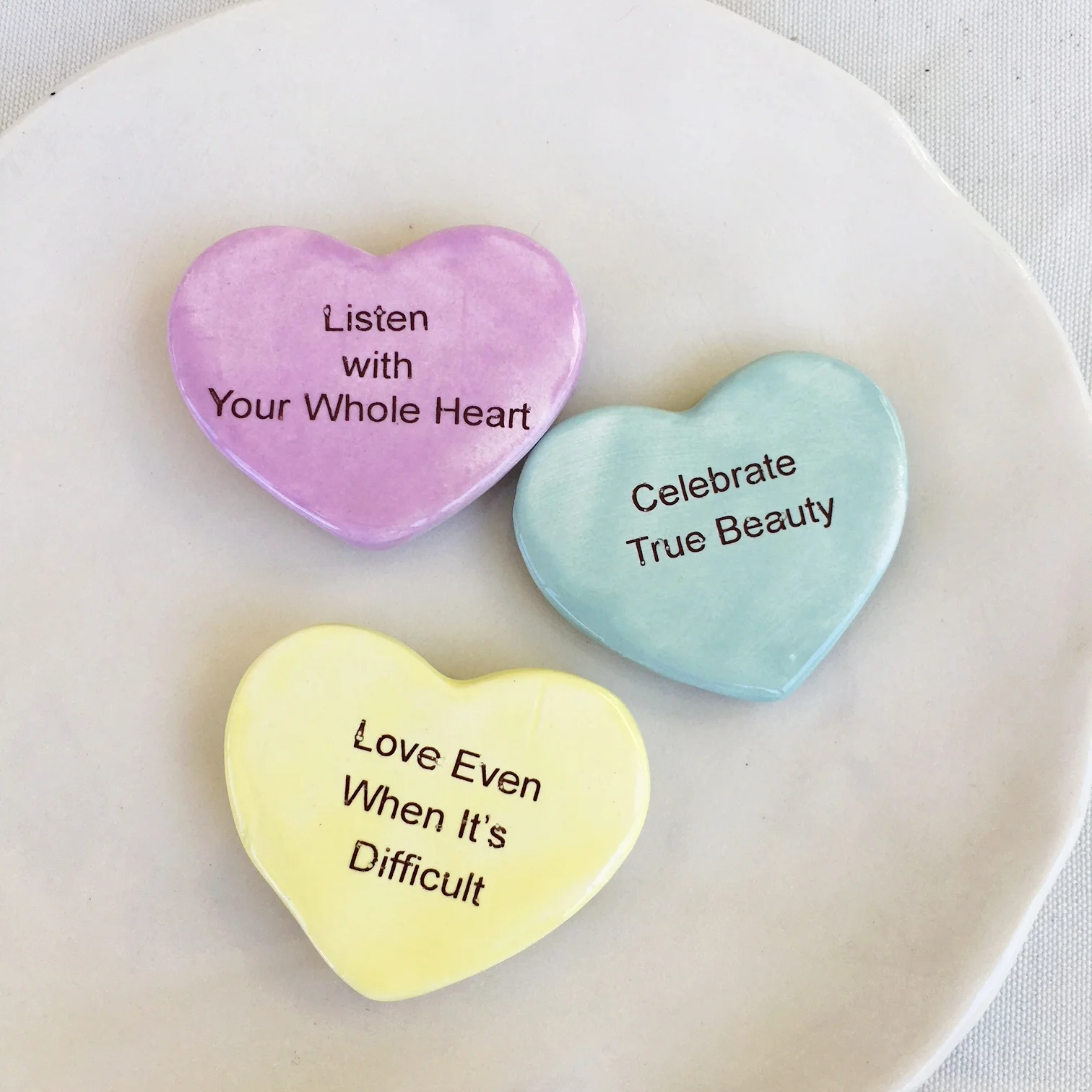 Love magnets on plate 1 .JPG