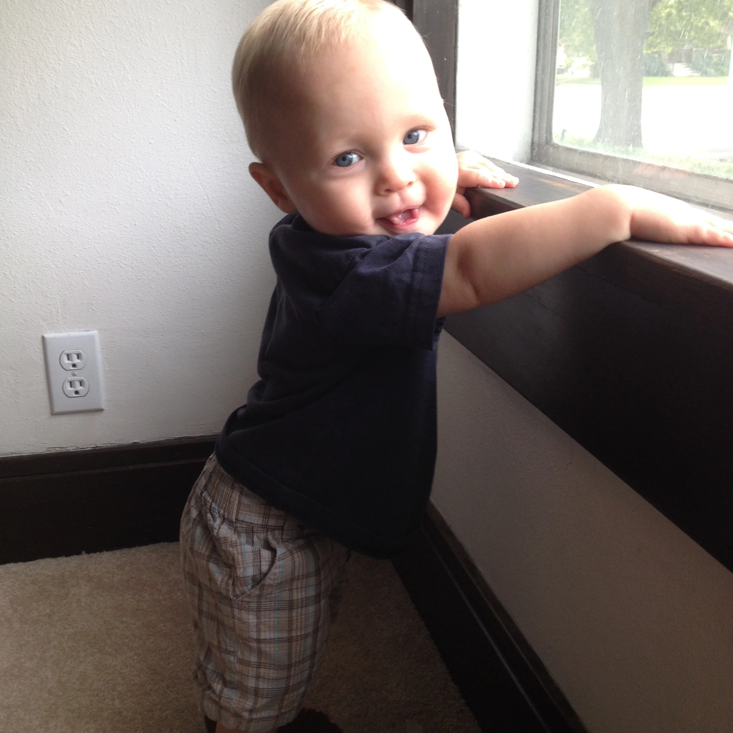 I have so many pictures of him standing like this by the window- it's one of his favorite places to hang out! 