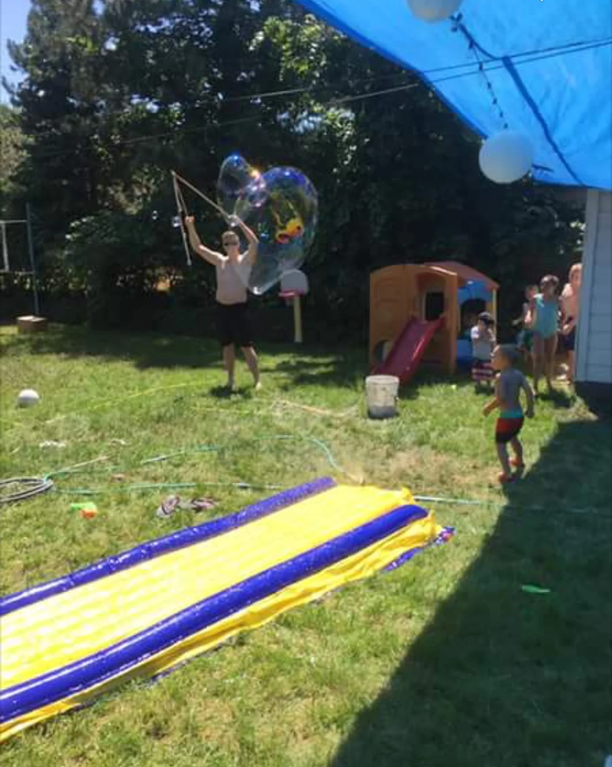 I stole this picture from Sarah on FB so the quality got a little wonky but look at this massive bubble Drew made!