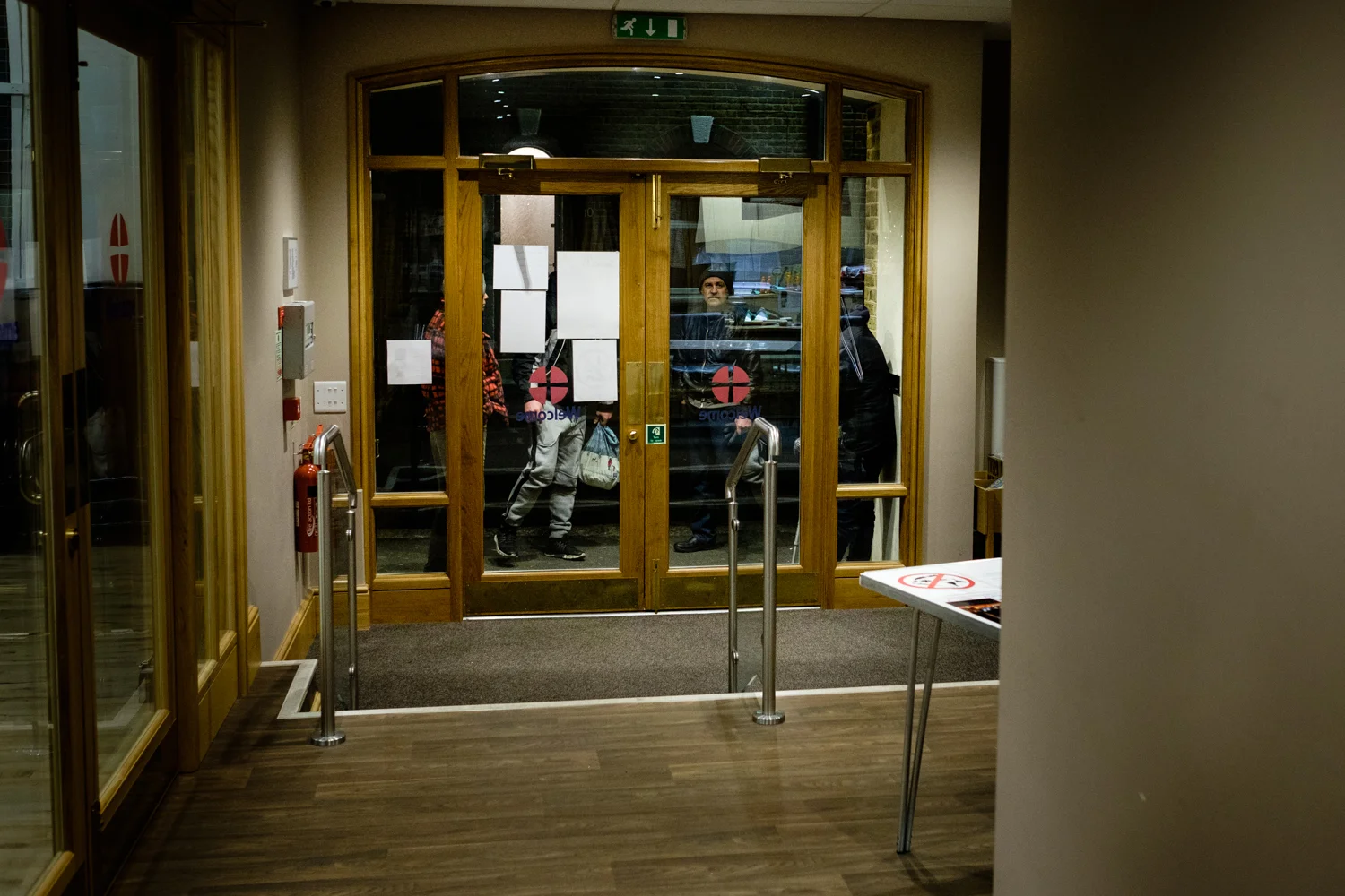 Guests at Sanctuary night hostel, waiting for opening time