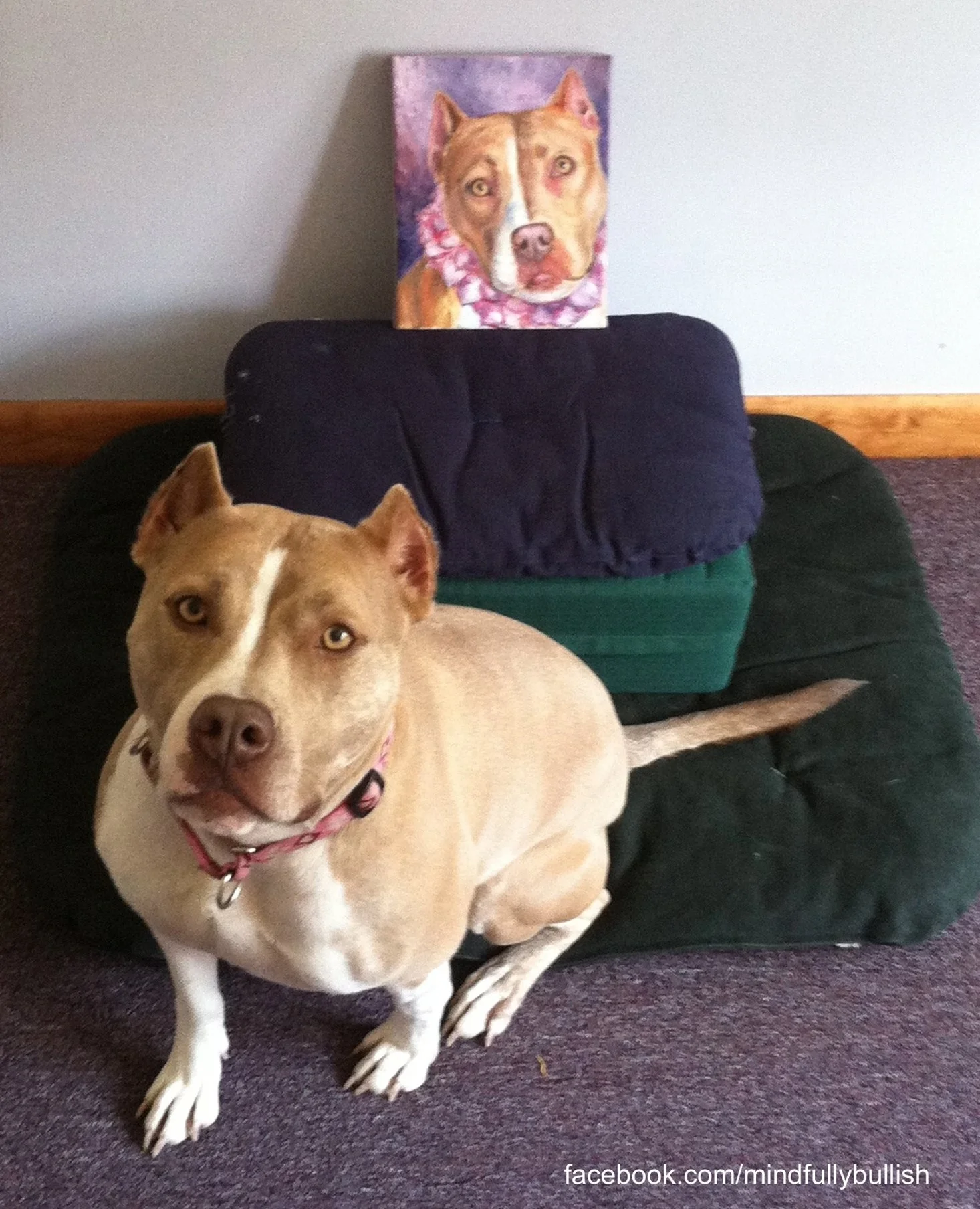 Aubrey posing with her portrait