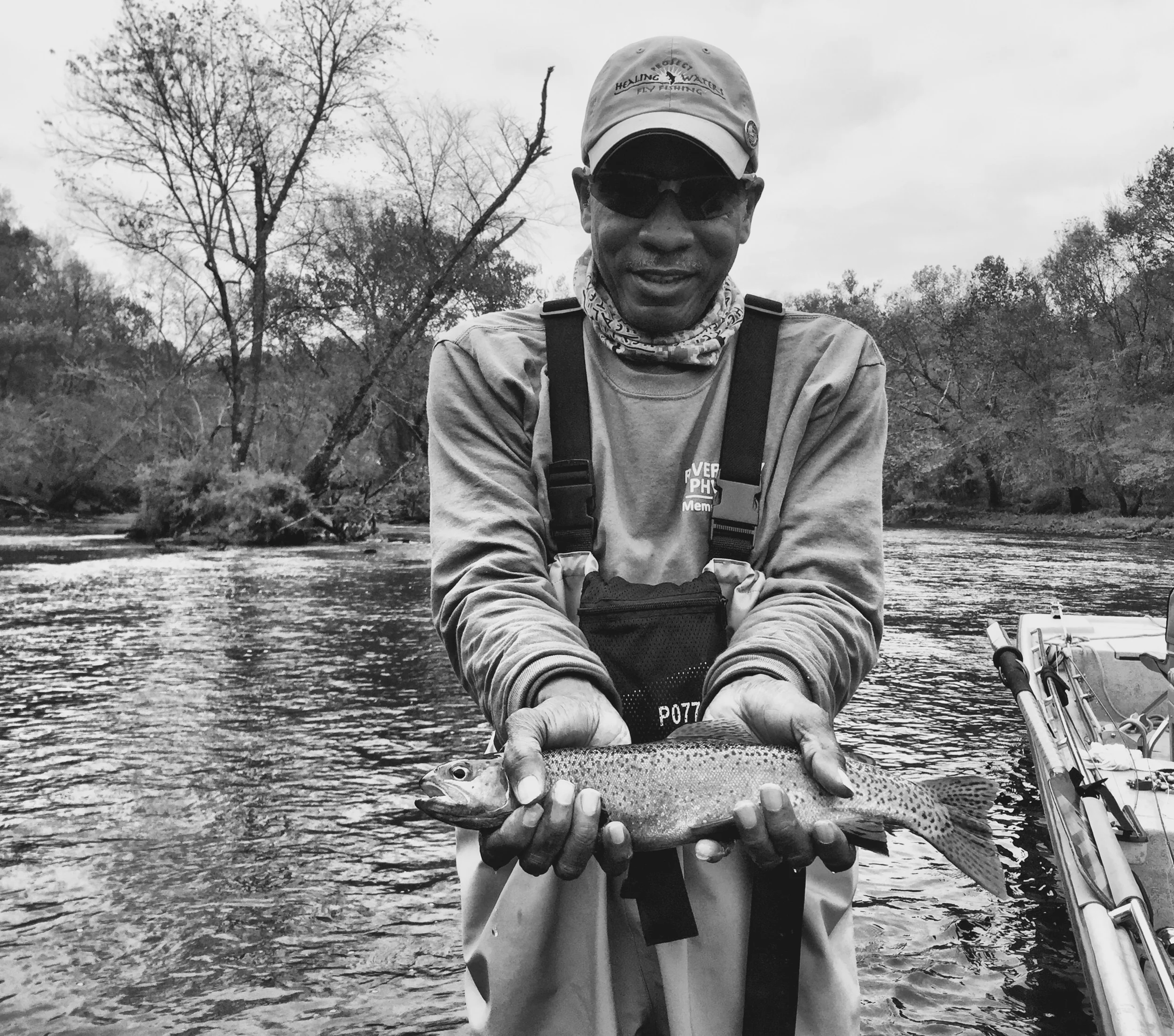 Vincent showing off one of his trophy Rainbow Trout