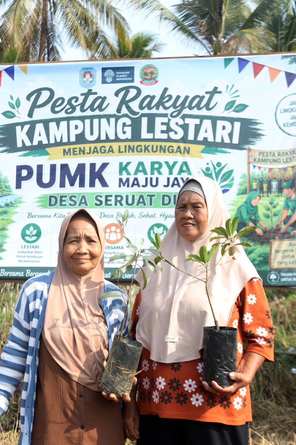 Residents of Seruat Dua gather for the Pesta Rakyat village festival in Kubu Raya
