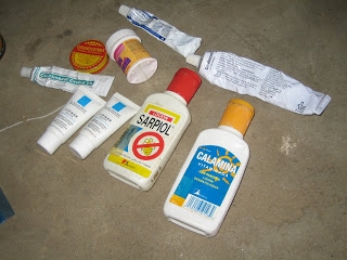 All the medications and creams she has tried to cure the periodic outbreaks of rashes on her son's body.