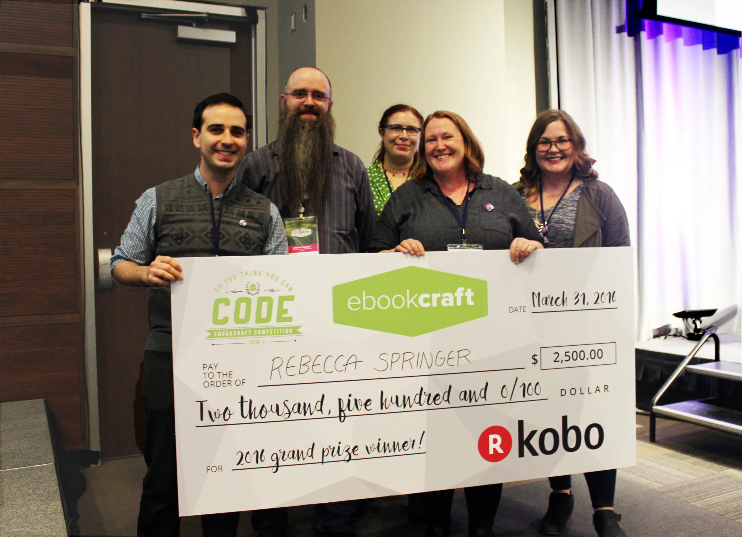 Kobo's Ben Dugas ( far left ) with winner Rebecca Springer ( second from the right ) with judges ( left to right ) Joshua Tallent, India Amos, and Monique Mongeon.