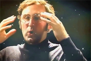 A gif of a man miming his head exploding surrounded by explosions and stars and space as the background.