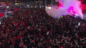 Gif showing crowd reaction in the Jurrassic Park, the fan area outside Scotiabank Arena in Toronto .