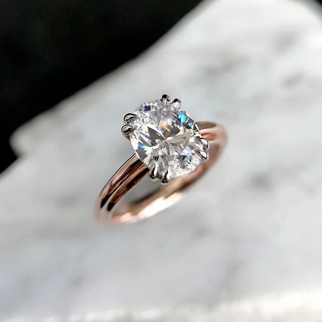Engagement Rings - Oval Solitaire with Yellow Gold Band .jpg