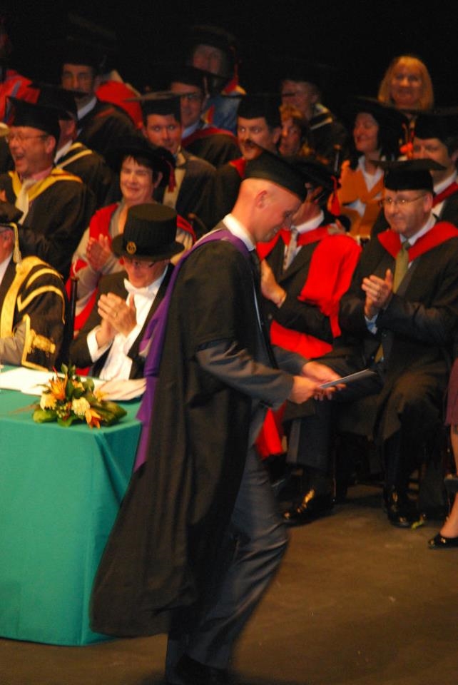 Me picking up my second award after being voted the Most Inspirational Tutor