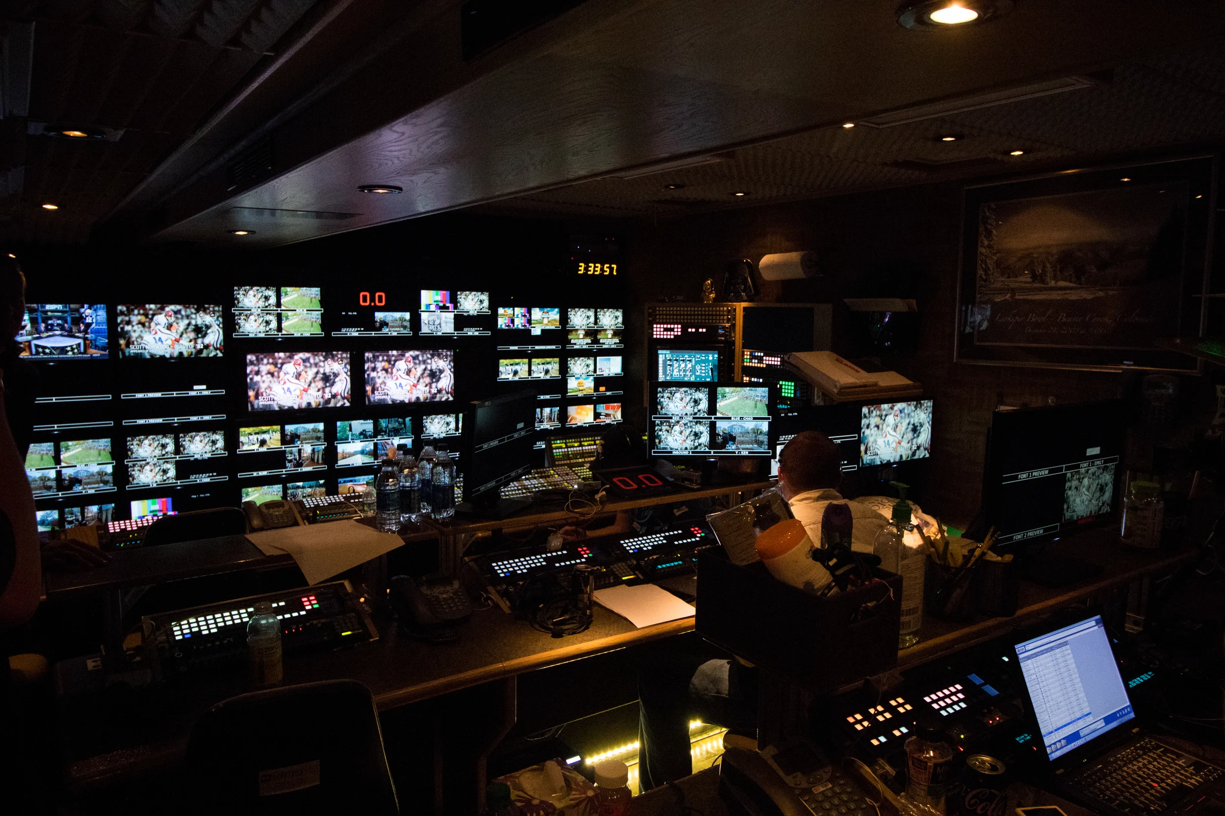 In the broadcast truck, the ESPN team works late into the night editing and preparing the content that will be featured the next morning during the show.
