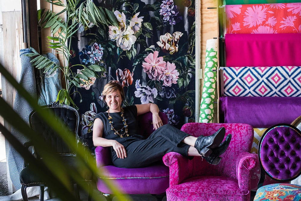 Little & Fox-Portrait of Asha Payton-environmental portait on sofas with colourful fabrics-napier.jpg