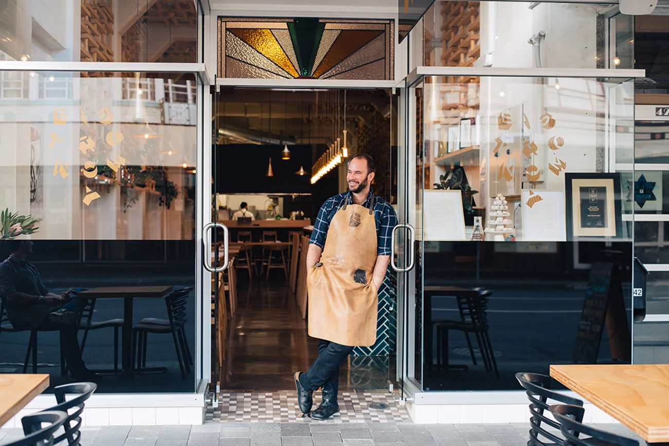 Napier restaurant Bistronomy owner James Beck photographed outside the restaurant by professional photographer Florence Charvin