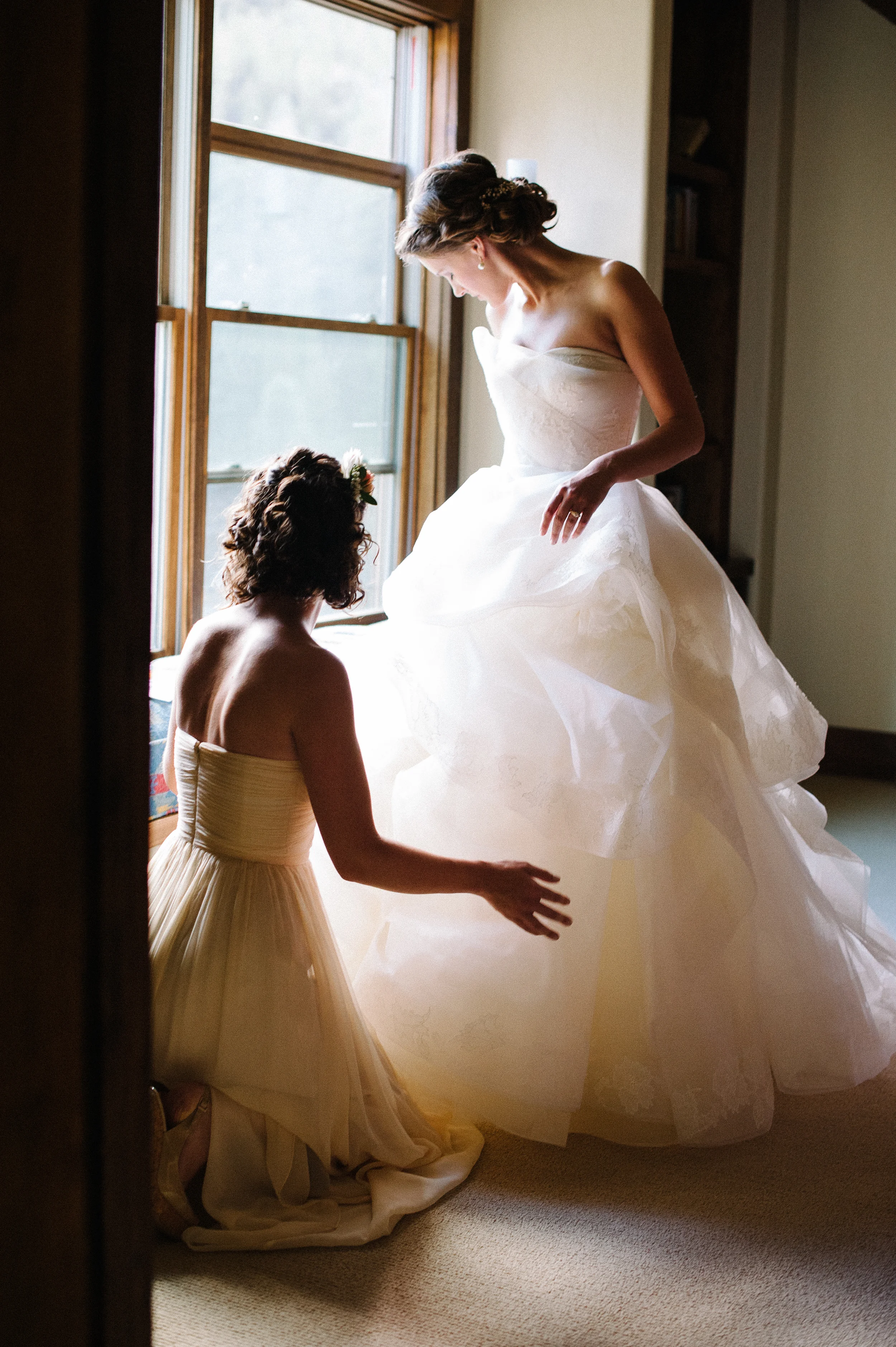 Bride Getting Ready with Maid of Honor