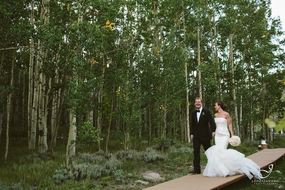 Bride & Groom Walking Through Aspen Trees