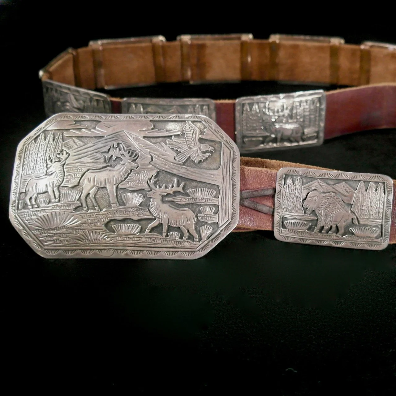 68-19 Sterling Silver Wildlife Concho Belt $3150.jpeg