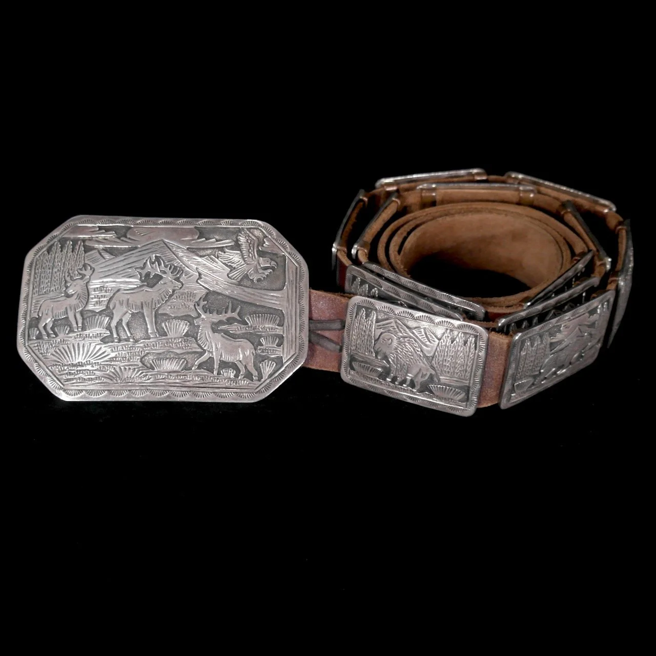 68-19 Sterling Silver Wildlife Concho Belt $3150...jpeg